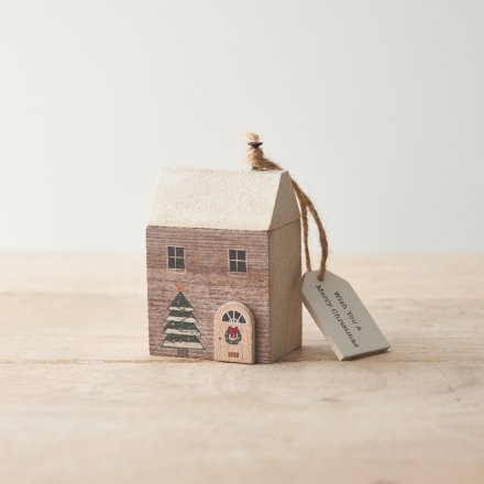 Wooden house with door and tree