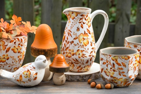 Autumn jug with leaves