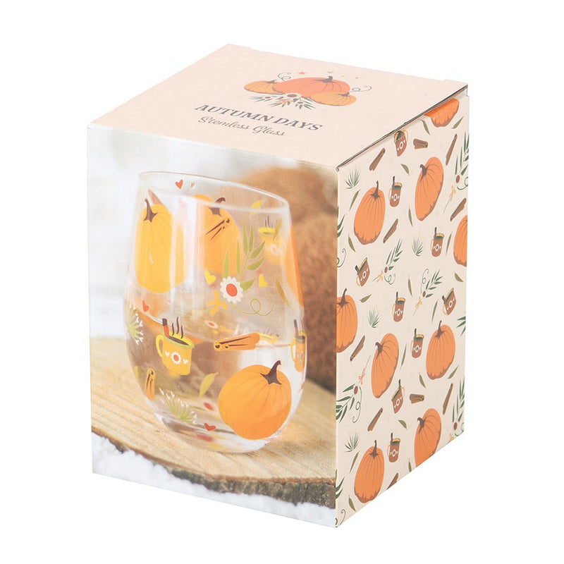Glass cup with autumn decoration