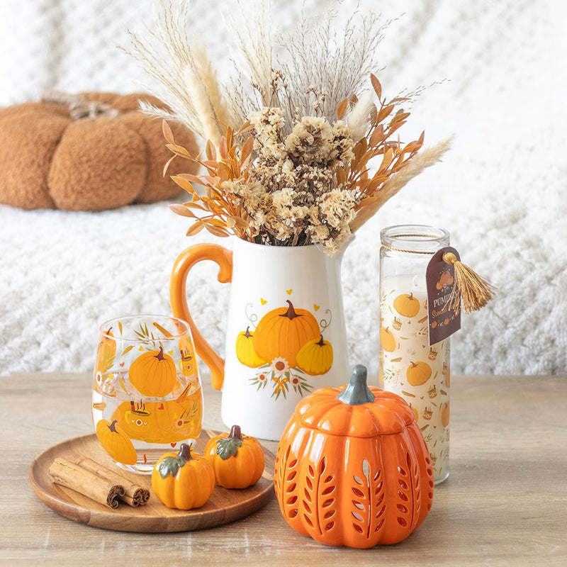 Glass cup with autumn decoration