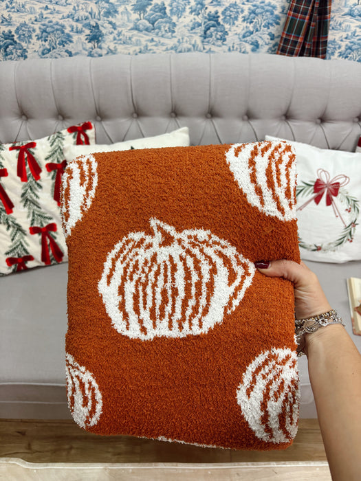 Plaid autunnale con zucche