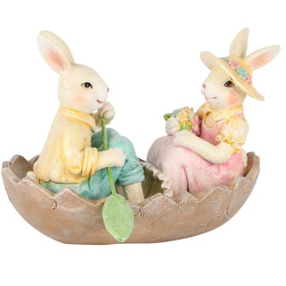 Couple de lapins dans un bateau