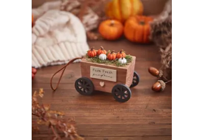 Decorative wooden cart with pumpkins