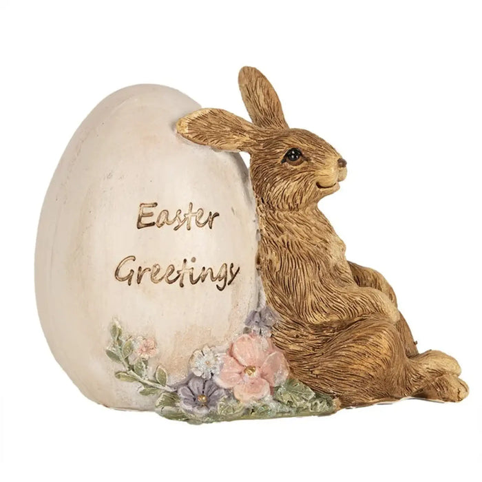 Statua decorativa coniglio con uovo in poliresina