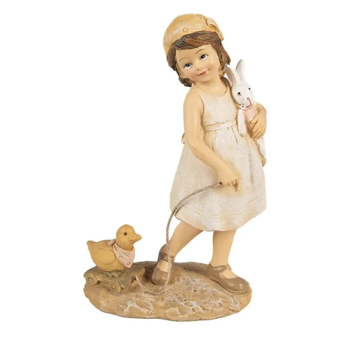 Statua bambina in poliresina beige con coniglio in braccio