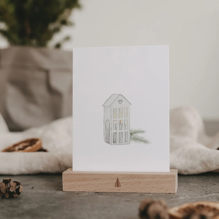 Carte de Noël en papier avec une maison